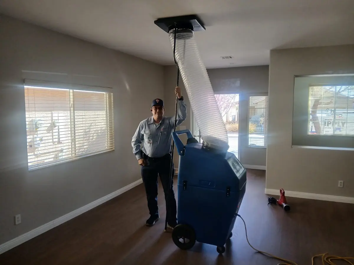 Professional Dryer Vent Cleaning work inside a Newbury home